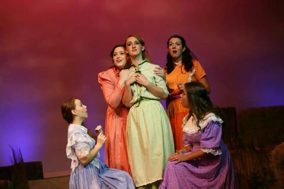 Haley Sprankle (center, in green) as Laurey in "Oklahoma!"